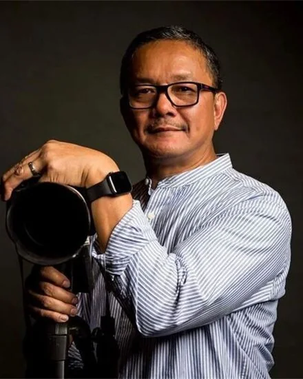 Fil-Am World Magazine official photographer holding a professional camera